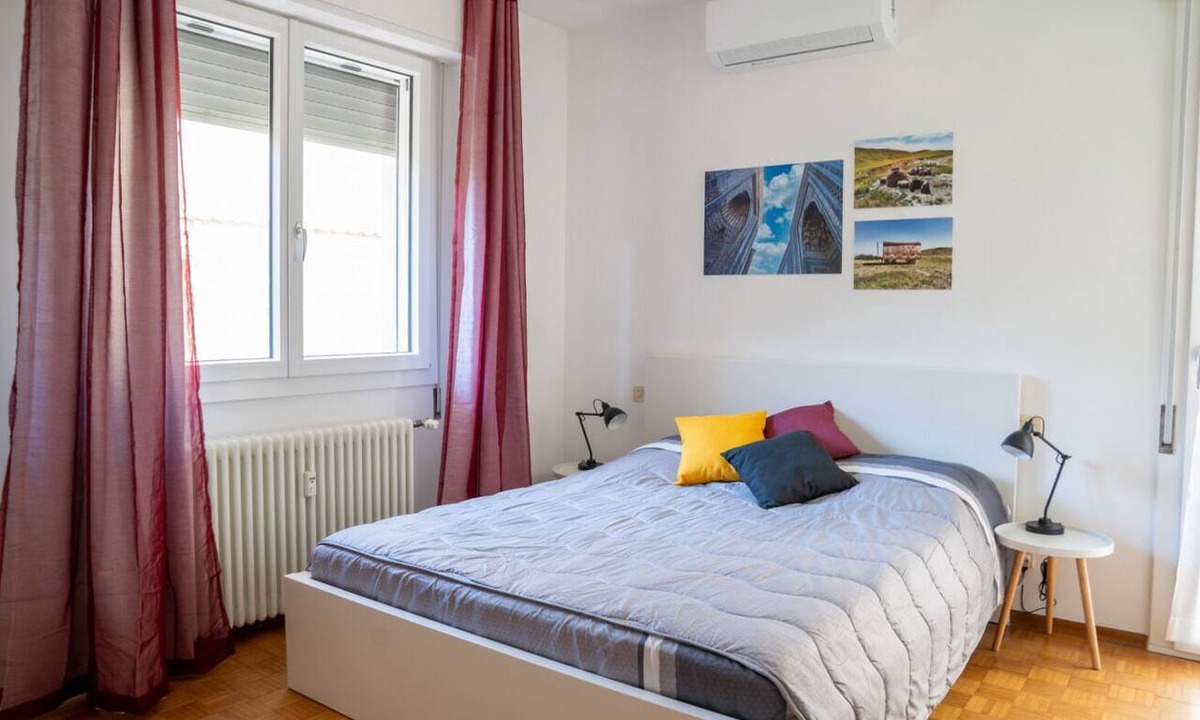 Ravenna House | A comfortable room within an 84-square-meter unit—perfect for three people—located on the ground floor of an Art Nouveau building.The property is situated in a quiet area of ​Ravenna that is ideally located for sightseeing; the city center is ju