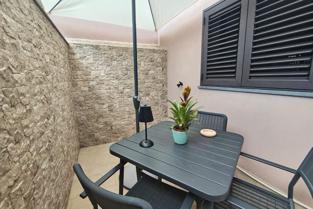 Zafferana Etnea Apartment | Apartment 'Perla Dell'Etna - Piano Terra' with Shared Terrace, Wi-Fi and Air Conditioning
