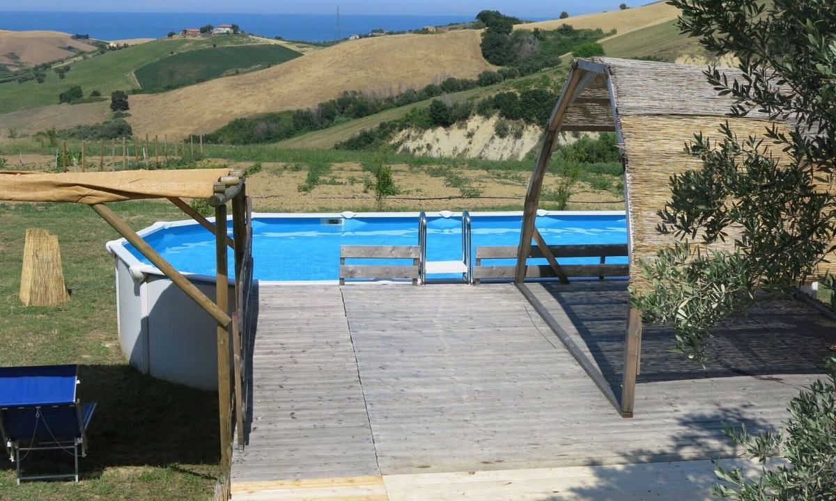 Cologna Spiaggia Villa | Beautiful apartment in villa with pool, WIFI, A/C, hot tub, TV, patio, pets allowed, panoramic view