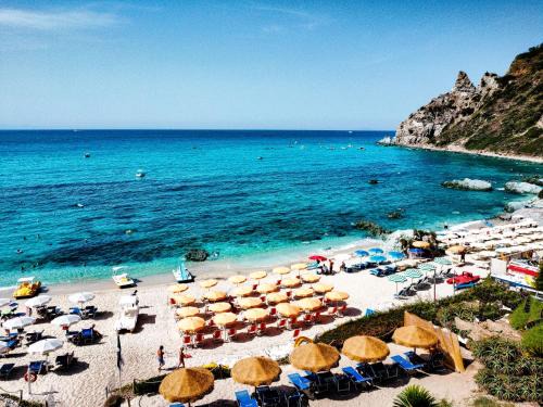 Ricadi Resort | Costa Real - Garden Retreat with Private beach, Pet Friendly