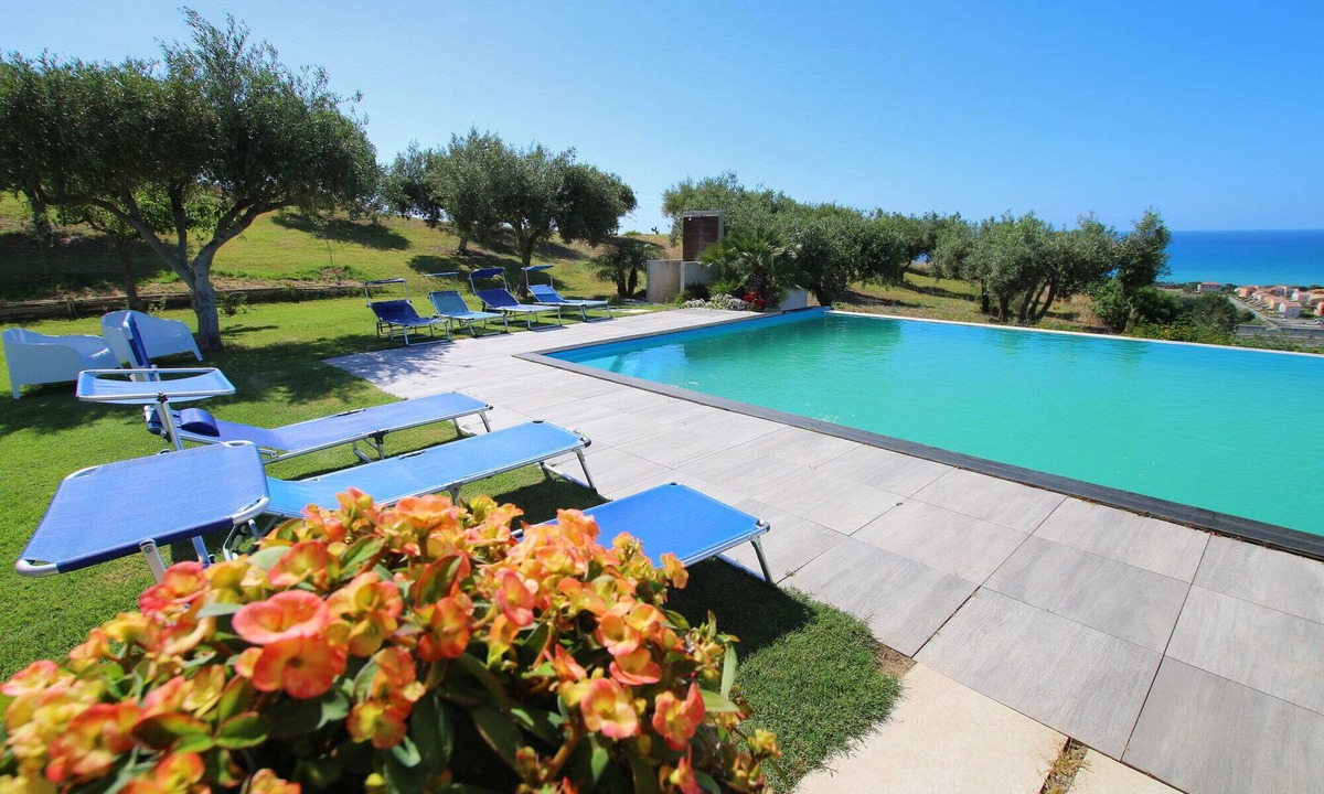 Campofelice di Roccella Villa | Modern Villa with Private Golf Practice, Pool, Garden, Terrace, Wi-Fi, Sea View