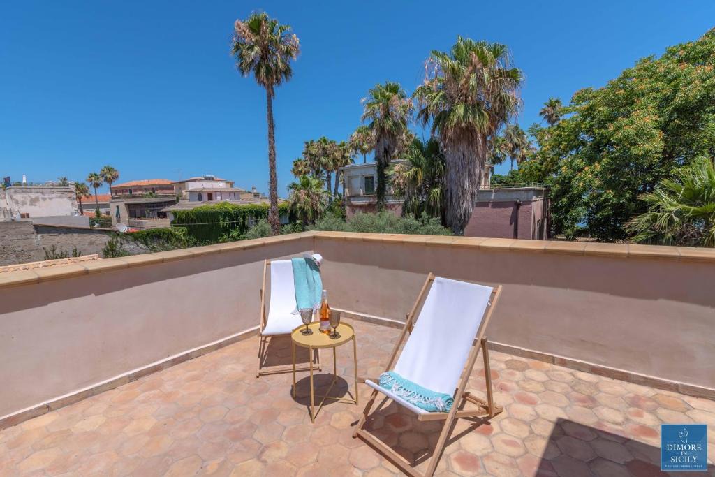 Santa Lucia Apartment | Sunset terrace apartment by Dimore in Sicily