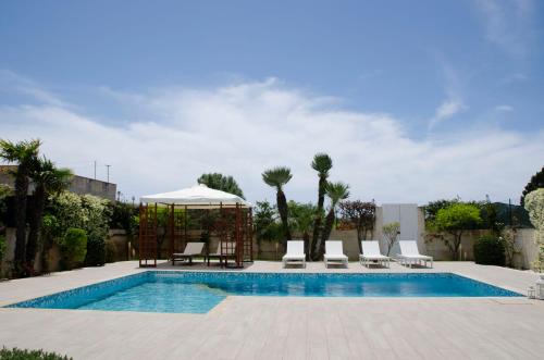 Santa Maria del Focallo Villa | Villa with Private Pool & Garden 10 min walk to the Beach