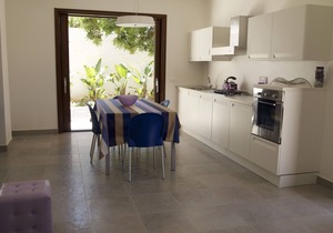 Elegant summer house in the shade of a centuries-old carob