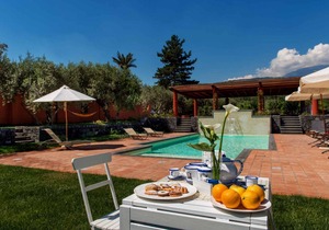 Holiday apartment with garden and outdoor swimming pool