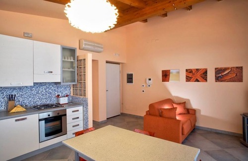 Capo d'Orlando Apartment | Ambra - 1-bedroom apartment with large lateral sea view terrace and pool in the garden
