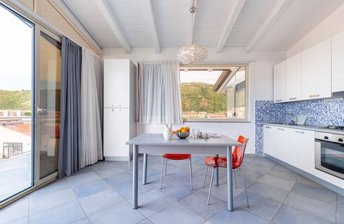 Capo d'Orlando Apartment | Ambra - 1-bedroom apartment with large lateral sea view terrace and pool in the garden