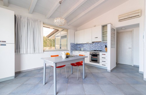 Capo d'Orlando Apartment | Ambra - 1-bedroom apartment with large lateral sea view terrace and pool in the garden
