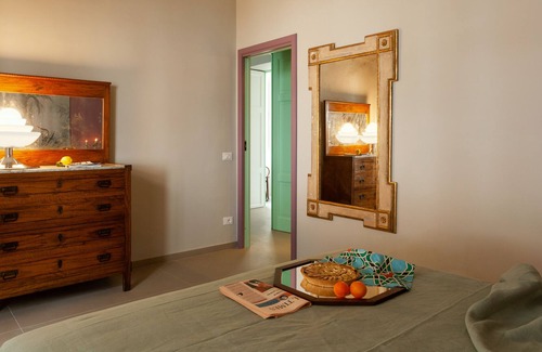 Malfa Apartment | Apartment with spacious terrace overlooking the sea in a villa with swimming pool and garden
