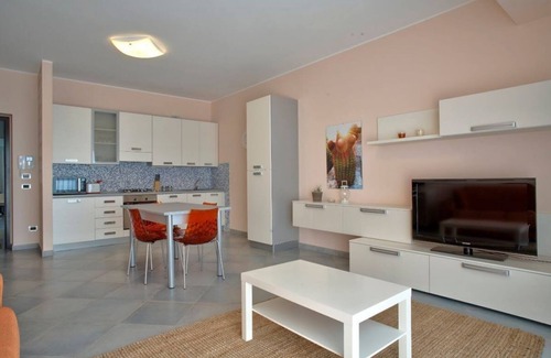 Capo d'Orlando Apartment | Arancio - 2-bedroom apartment with large panoramic sea view terrace and pool in the garden