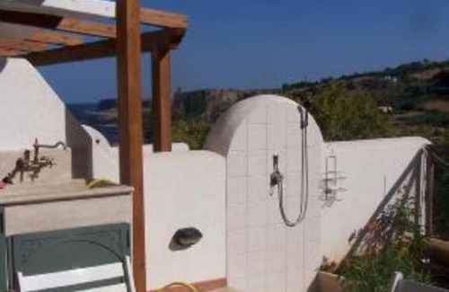 Macari Villa | blue house distance