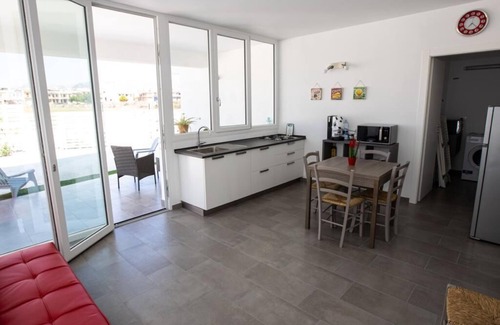 Eastern Sicily Apartment | Modern and brand new apartment in villa five minutes from the sea and downtown