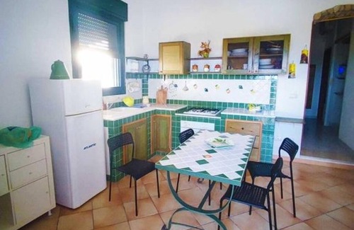 Marzamemi Apartment | Three Palms Houses San Lorenzo: Green Apartment