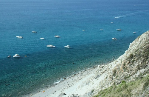 Province of Messina House | Vacation Home "Oasi Azzurra - Trilocale Plus 2" with Sea View, Shared Pool & Shared Terraces