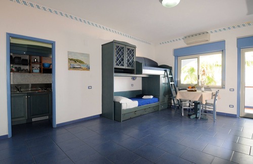 Province of Messina House | Vacation Home "Oasi Azzurra - Monolocale Standard 1" with Shared Pool & Shared Terraces