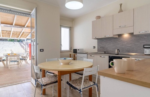 Torre di Faro Apartment | A cozy apartment of approximately 90 square meters, spread over two levels connected by stairs, accommodating up to 6 people.The property is located in Torre Faro, a charming seaside village about 15 km from Messina, where the Ionian and Tyrrhenian Seas