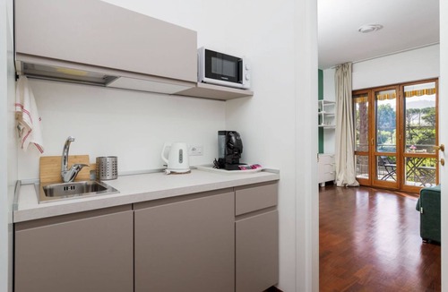 Sant'Agnello Apartment | A sense of calm defines the experience from the very first step inside. La Perla Rara is located in a well-kept residential building along Viale dei Pini, a quiet and elegant area just a short walk from the center of Sant’Agnello. The interiors are bri