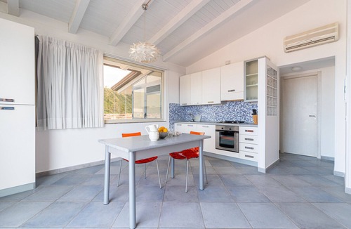 Capo d'Orlando Apartment | Ambra - 1-bedroom apartment with large lateral sea view terrace and pool in the garden