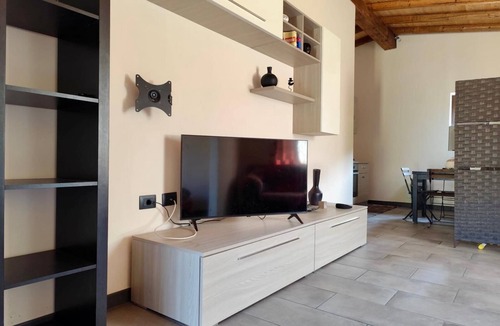 Pedara Apartment | Ancient millstone of Etna