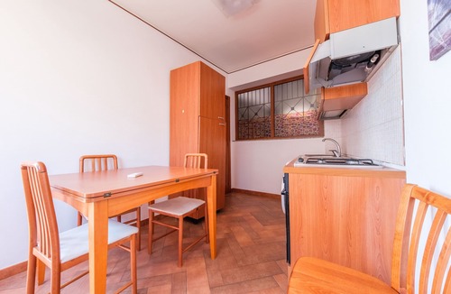 Mazzeo Apartment | Apartment 'Appartamento Daisy' with Sea View, Wi-Fi and Air Conditioning