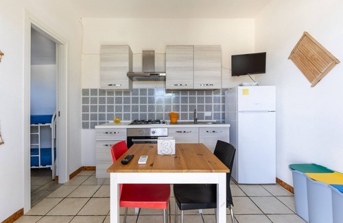 Punta Braccetto Apartment | Apartment 'Caretta' with Private Terrace, Wi-Fi and Air Conditioning