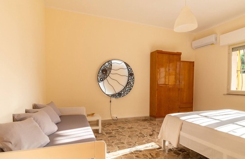 Sampieri Apartment | Apartment 'Carignano 94' with Private Terrace, Wi-Fi and Air Conditioning