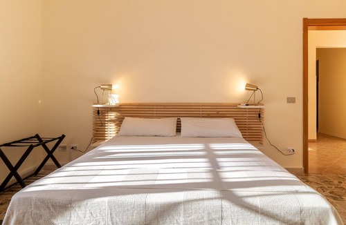 Sampieri Apartment | Apartment 'Carignano 94' with Private Terrace, Wi-Fi and Air Conditioning