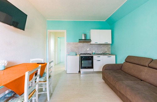 Patti Apartment | Apartment 'La Risacca Suite' with Sea View, Private Terrace and Air Conditioning