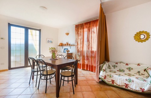 Santo Stefano Apartment | Apartment 'Mandorlo' with Sea View, Private Terrace and Wi-Fi