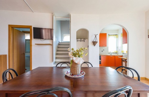 Santo Stefano Apartment | Apartment 'Mandorlo' with Sea View, Private Terrace and Wi-Fi