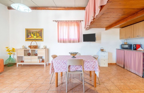 Granelli Apartment | Apartment 'Nonna Rosa' with Private Terrace, Shared Garden and Air Conditioning