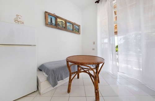 Lingua Apartment | Apartment 'Quadara - Il Nido' with Sea View, Private Terrace and Shared Garden