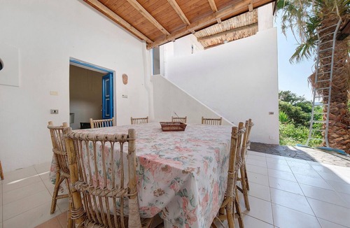 Lingua Apartment | Apartment 'Quadara - Il Palmento' with Sea View, Private Terrace, and Shared Garden