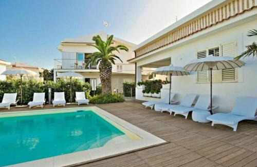 Marchesana Apartment | Apartment Schöne Ferienwohnung am Meer by Interhome