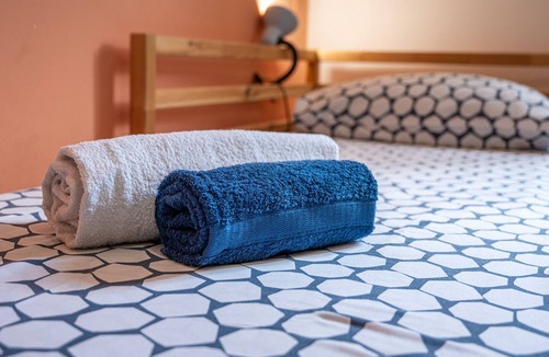Sant'Ambrogio Apartment | Apartment 'The Village House' with Balcony, Wi-Fi and Air Conditioning