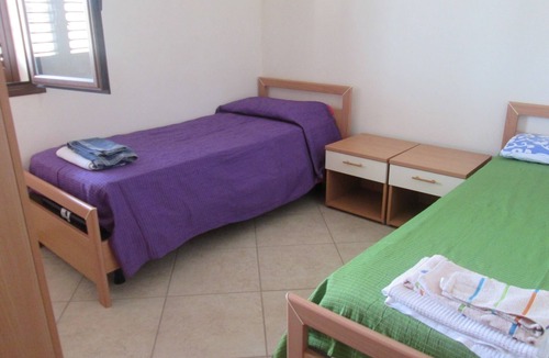 Tre Fontane Apartment | Apartment with covered terrace and barbecue near sea and center