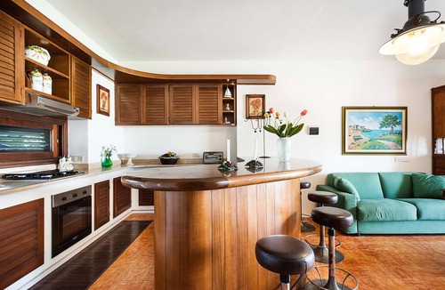 Stazzo Apartment | Apartment with terrace and direct access to the sea. Shared pool. Lampara