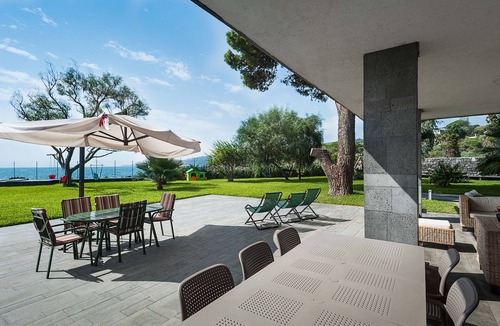 Stazzo Apartment | Apartment with terrace and direct access to the sea. Shared pool. Lampara
