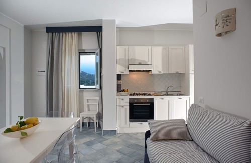 Villammare Apartment | Apartment with terrace. Shared pool. 150 metres from beach