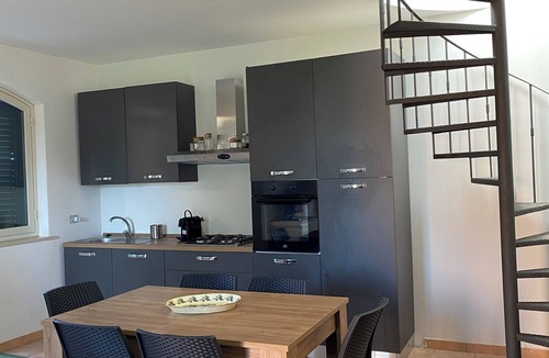 Eastern Sicily Apartment | Apartment with terrace overlooking crystal clear sea. Parking space. Pets allowed