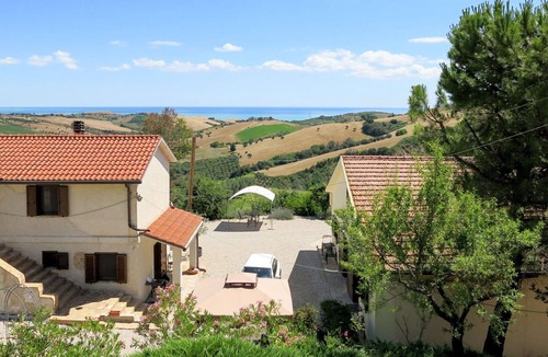 Cologna Spiaggia Villa | Beautiful apartment in villa with pool, WIFI, A/C, hot tub, TV, patio, pets allowed, panoramic view