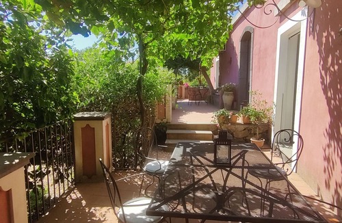 Sant'Anna Apartment | By the sea, large terrace enjoying fantastic views of Etna, shared pool