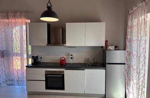 Mascali House | Casa Naxos: Holiday home, 3 bedrooms, kitchen, 2 baths, terrace & vineyard