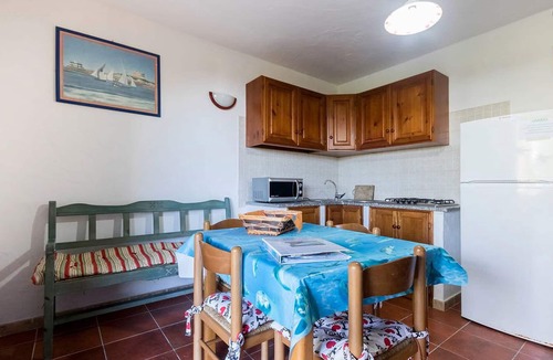 Sant'Antioco House | cottage with sea view terrace /solarium, exclusive garden, 2 bedrooms, 1 bathroom