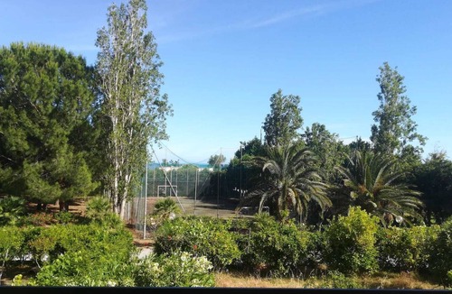 Milianni Apartment | Cozy apartment a stone's throw from the sea, with private parking space