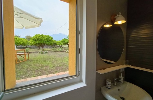 Archi House | Cozy house with garden surrounded by citrus trees between the sea and Etna.