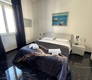 Grottasanta Apartment | Dyo Adelfia, elegante loft vista mare