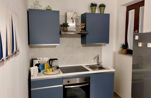 Carrozziere Apartment | Elegant apartment on the Ortigia waterfront, 2 steps from Syracuse Cathedral.