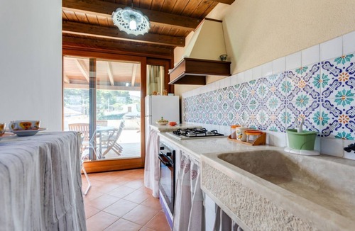 Custonaci Apartment | GuestHost - Bright and welcoming 35sqm apartment located on the first floor of an independent villa in Custonaci, a quiet countryside location a short distance from Erice and Cornino! The apartment has a large terrace with outdoor furniture and is comple