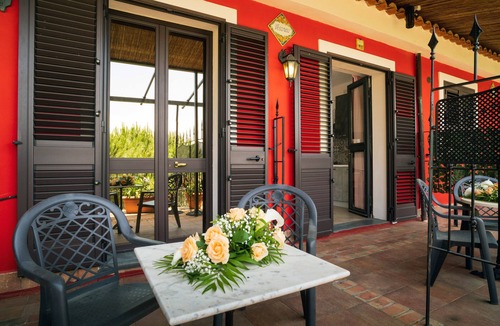 Castelmola Apartment | Holiday Apartment 'Garden Cottage I Dammusi - Arancio' with Mountain View, Shared Pool & Wi-Fi